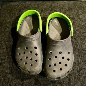 Navy blue and lime green crocs. New condition